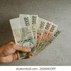 59674-01-rychle-a-spolehlive-pujcky-mans-hand-holding-czech-koruna-260nw-2636041059.jpg
